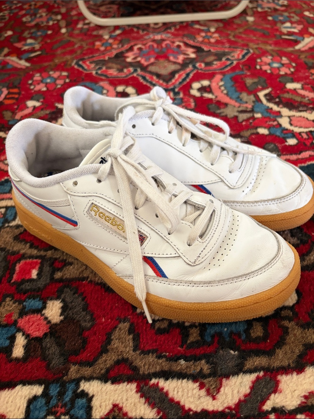 Reebok women’s Classic White Leather Sneakers with Gum Sole